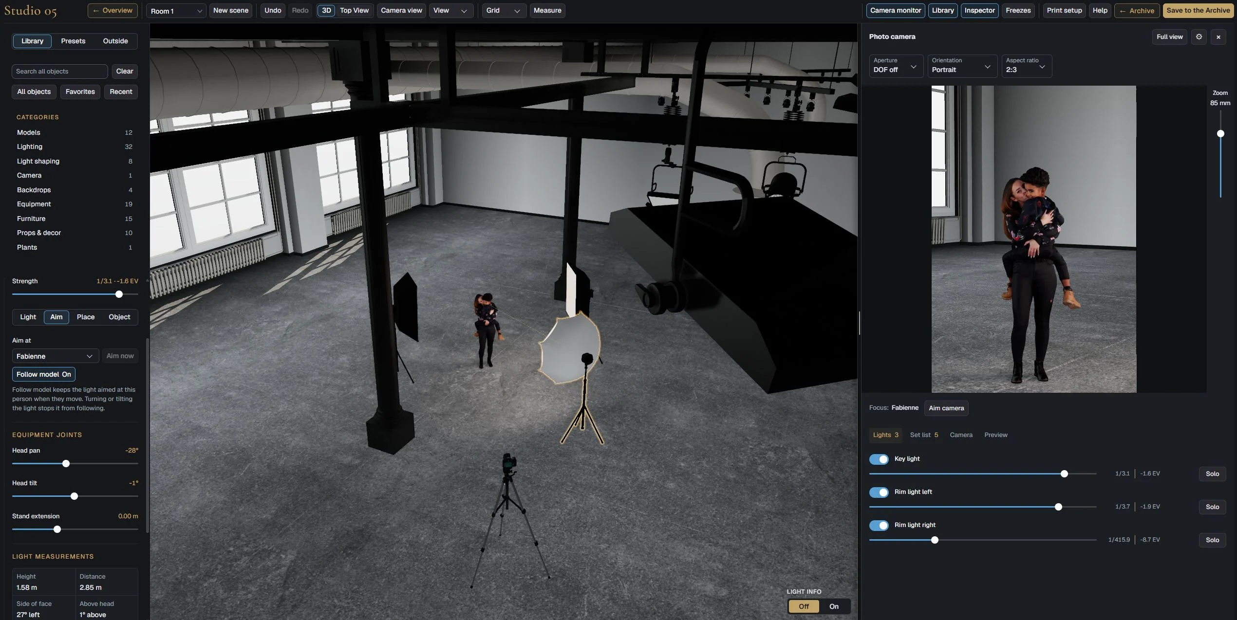 Studio 5 Set Builder with a couple in a large industrial studio and the camera monitor open next to the 3D view